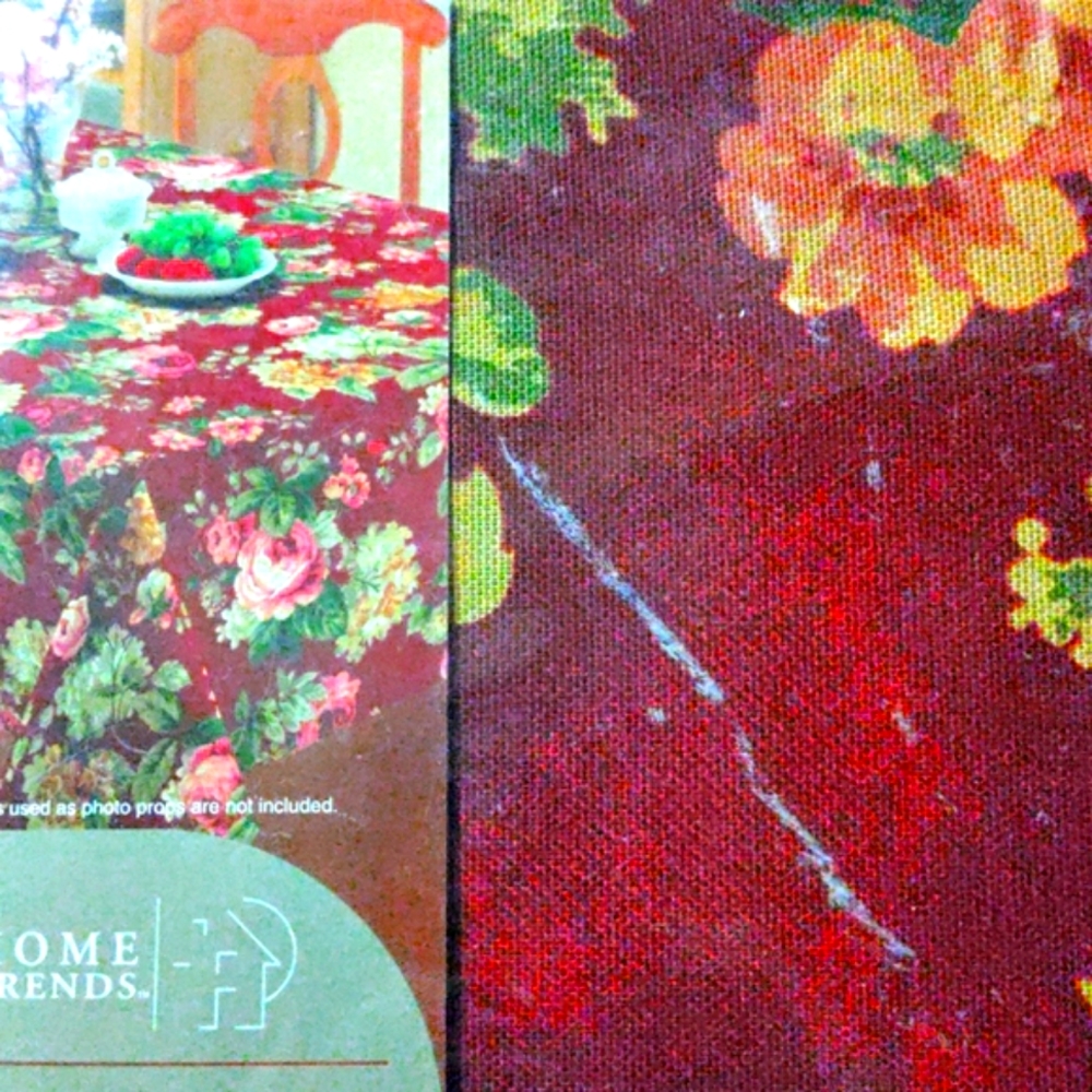 Home Trends fabric oblong table cloth. Rich beautiful colors.NWT